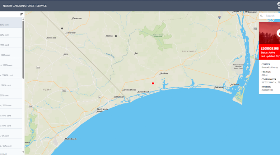 The fire, indicated by the red dot southwest of Shallotte on the North Carolina Forest Service public viewer, was caused by lightning, officials say.