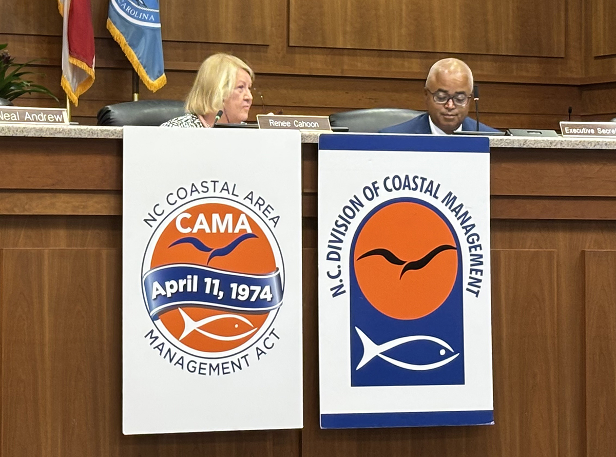 Coastal Resources Commission Chair Renee Cahoon and Division of Coastal Management Director Tancred Miller preside over the commission's meeting last week in Manteo. Photo: Catherine Kozak