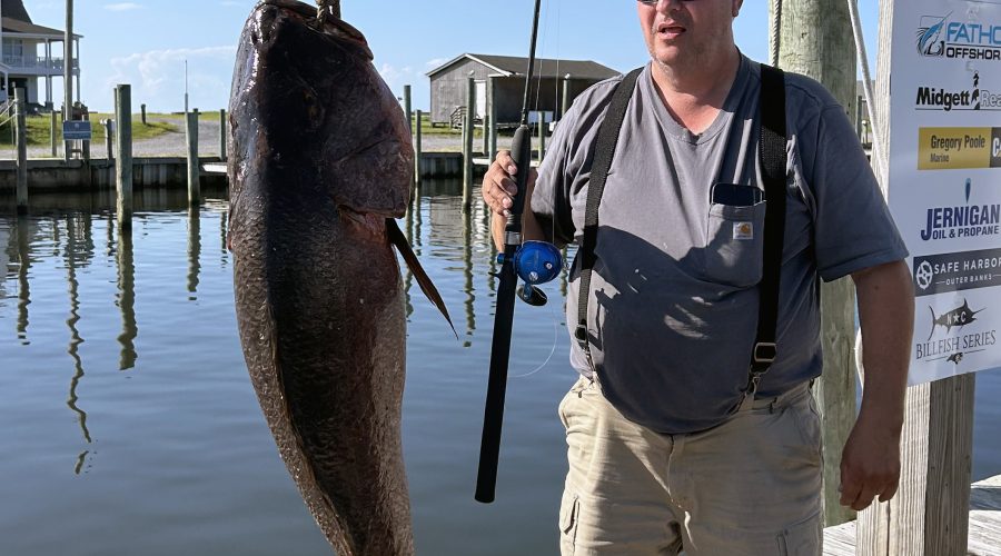 David Ashman of Mohnton, Pennsylvania, poses with the record cubera snapper he caught July 31 off Cape Hatteras. Photo: Division of Marine Fisheries