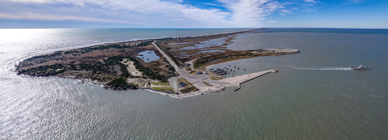 An N.C. Department of Transportation ferry leaves the terminal recently at the north end of Ocracoke Island in Hyde County, where it will cross Hatteras Inlet for Hatteras Island in Dare County. The route is traveled several times a day currently at no cost to passengers. Photo Illustration: Dylan Ray