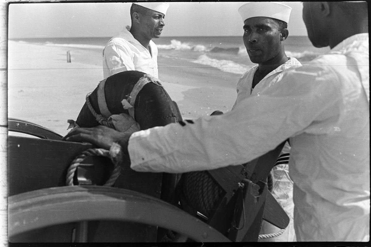 Coast Guardsmen with the Pea Island Station crew are shown up close in this newly discovered 1938 image from the SR.44.47 Conservation and Development Travel Information Photograph Collection, State Archives of North Carolina.