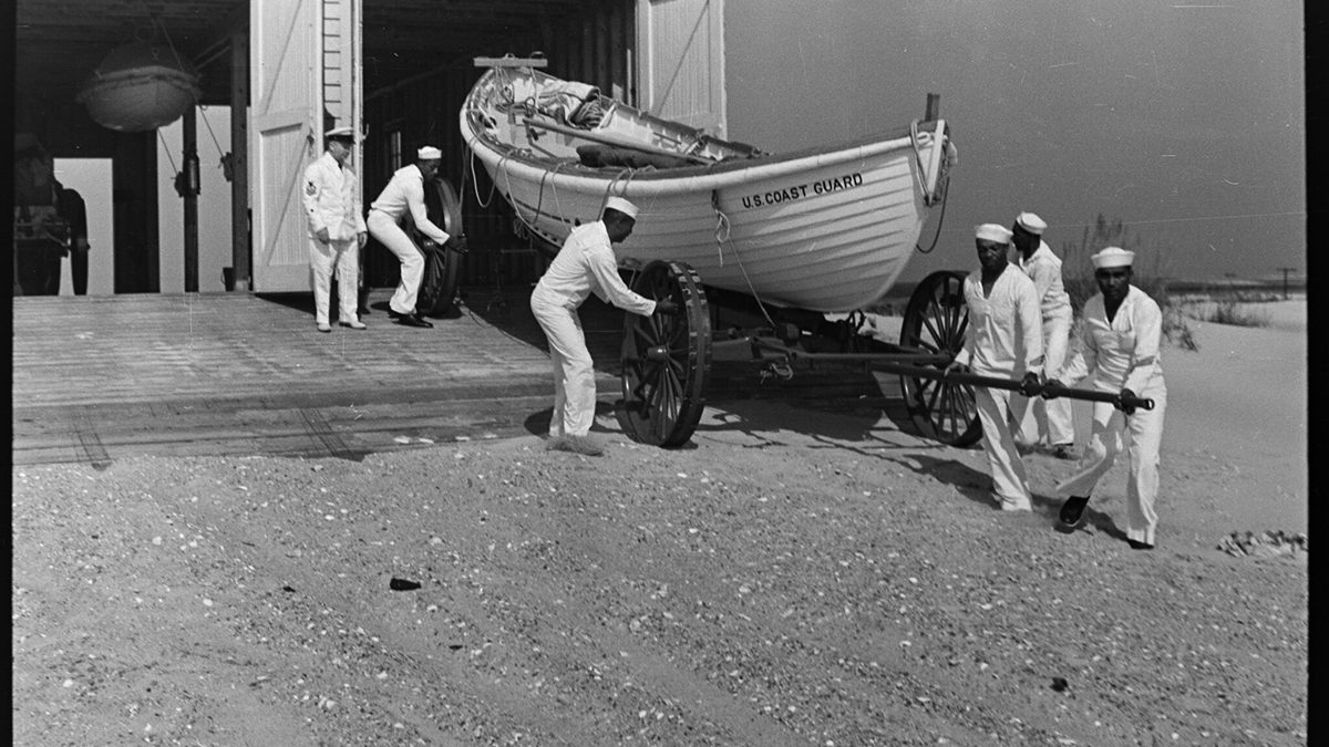 The Pea Island Station crew wheels out a lifesaving boat in this newly discovered 1938 image from the SR.44.47 Conservation and Development Travel Information Photograph Collection, State Archives of North Carolina.