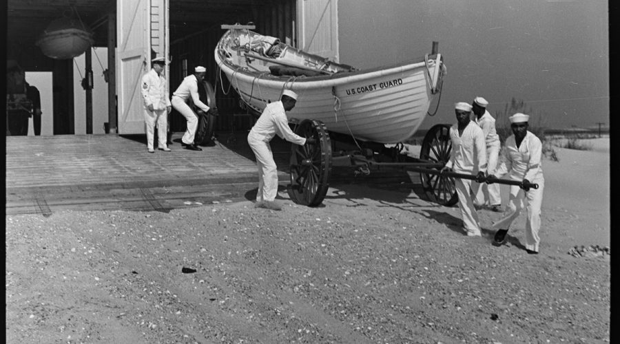 The Pea Island Station crew wheels out a lifesaving boat in this newly discovered 1938 image from the SR.44.47 Conservation and Development Travel Information Photograph Collection, State Archives of North Carolina.