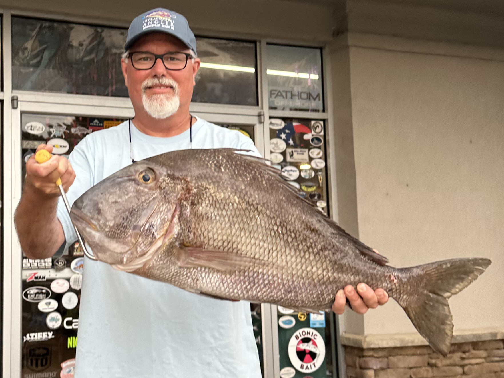Brock Davenport of Beaufort poses with his new state record catch jolthead porgy. Photo: Division of Marine Fisheries