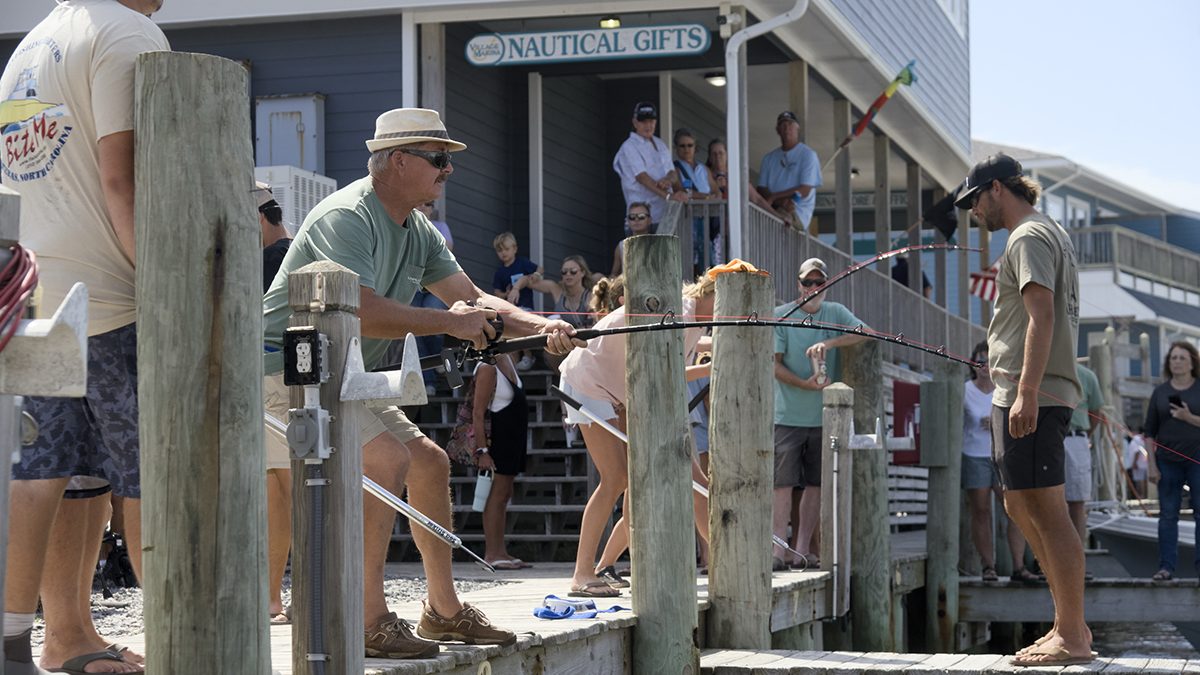 Participants compete in reeling in a big one during the Concrete Marlin and Sailfish competitions at the 22nd annual Day at the Docks Saturday in Hatteras Village. It’s harder than it looks. Photo: Kip Tabb