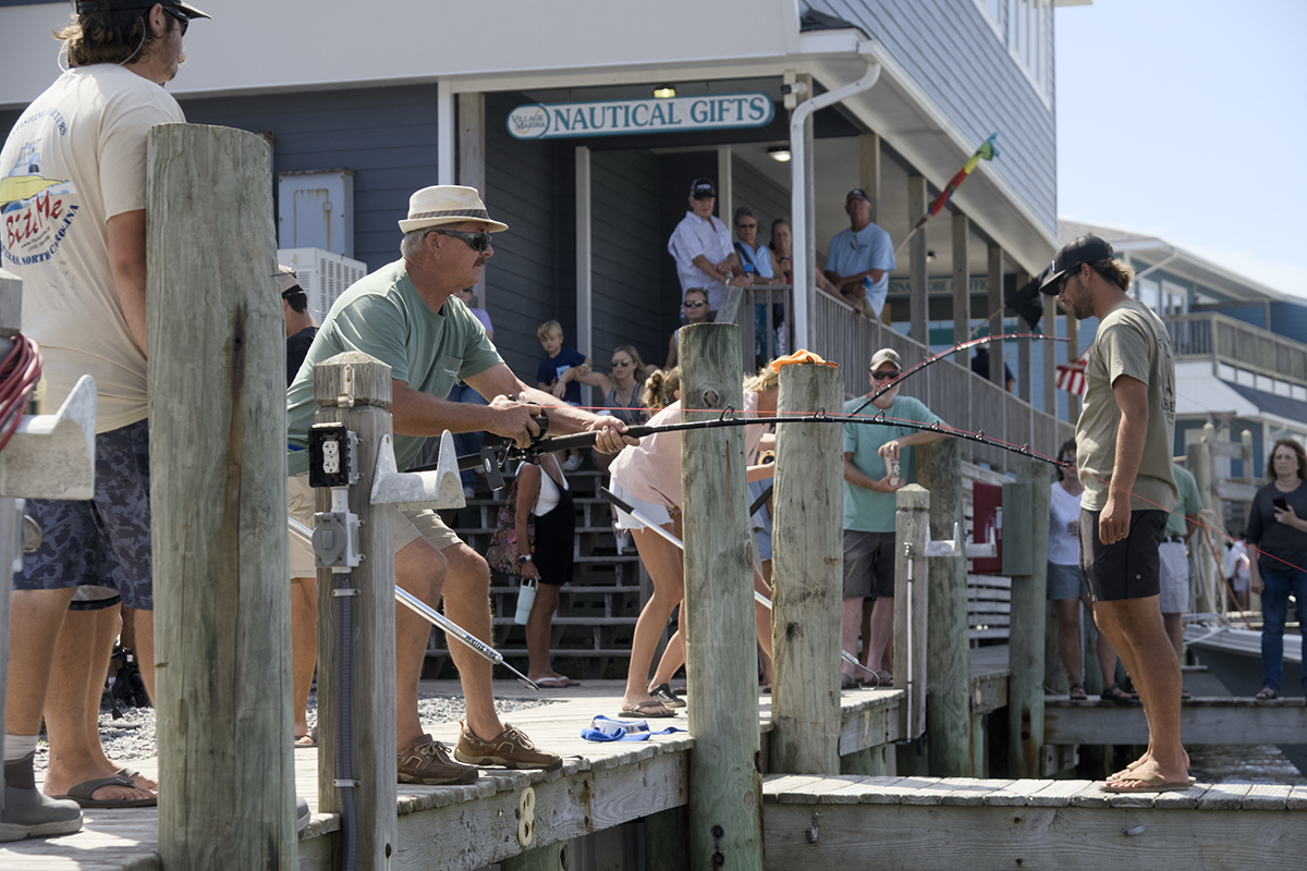 Participants compete in reeling in a big one during the Concrete Marlin and Sailfish competitions at the 22nd annual Day at the Docks Saturday in Hatteras Village. It’s harder than it looks. Photo: Kip Tabb