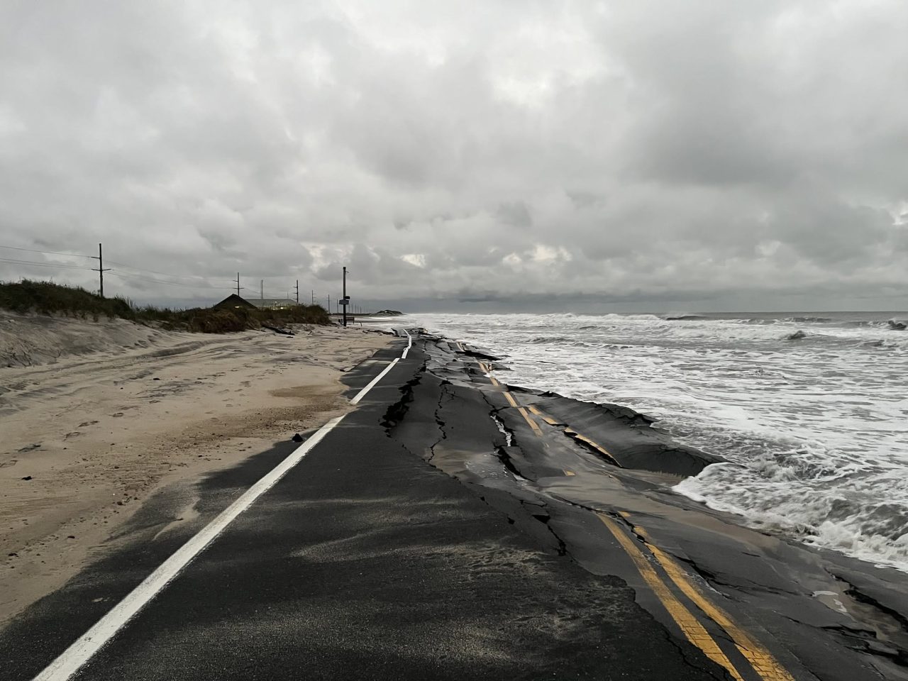 N.C. Highway 12 between the Basnight Bridge and Rodanthe has been closed since Sept. 24 because of damage related to the fall nor'easter. Photo: NCDOT