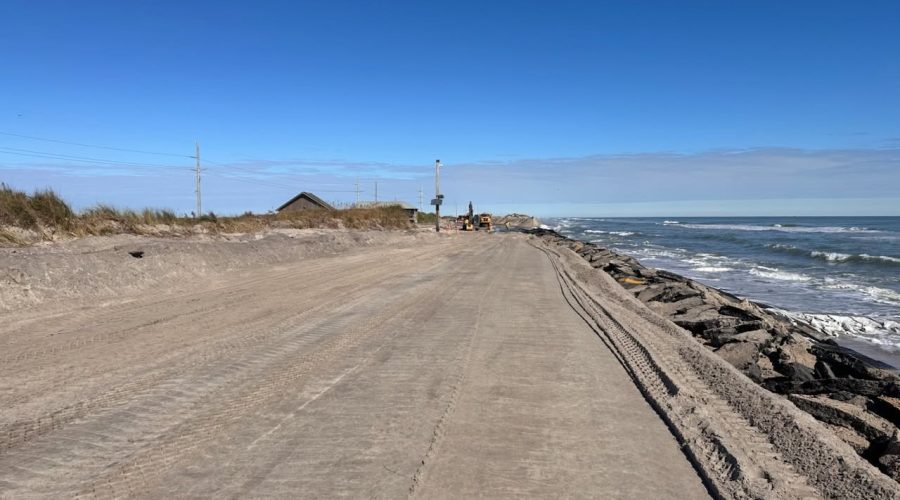 N.C. Department of Transportation crews work Monday to rebuild N.C. 12 between the Marc Basnight Bridge and Rodanthe. Photo; NCDOT