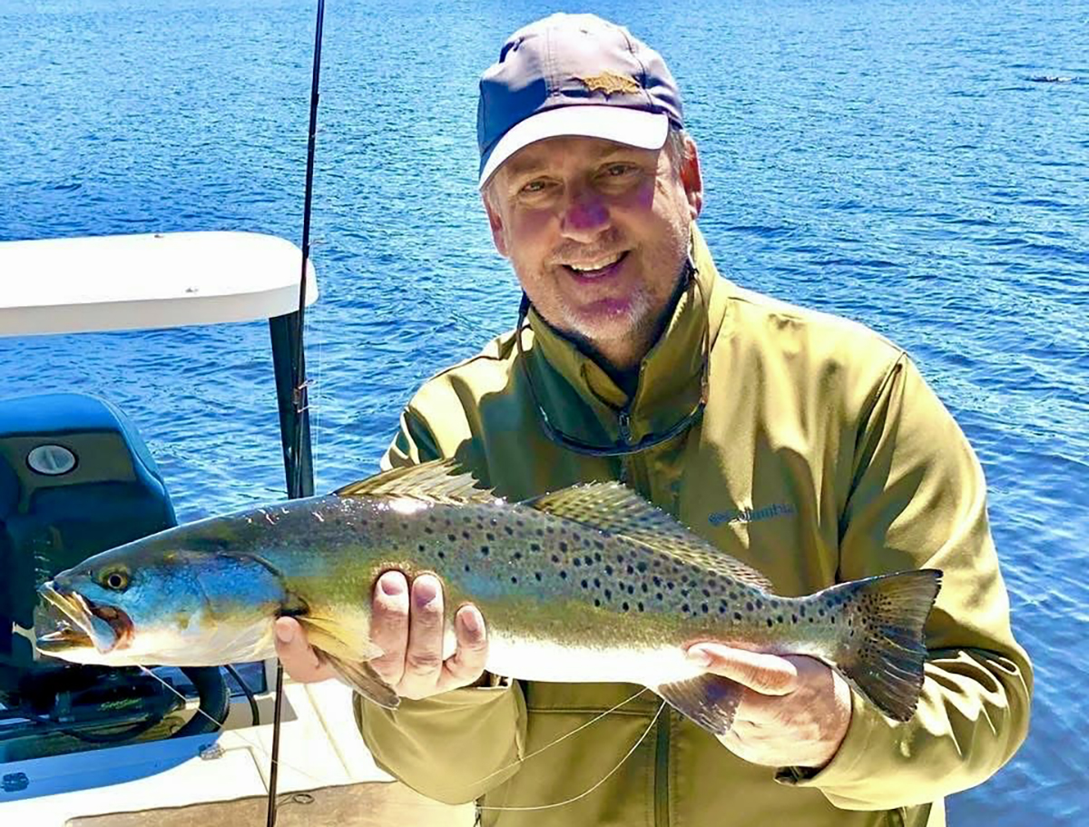 This more-than-7-pound trout was caught under surfacing gar.